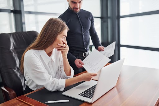 women and man in office