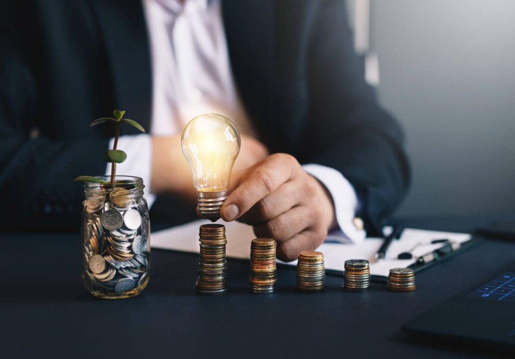 man holding lightbulb