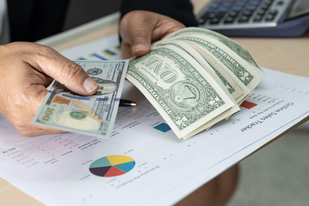 man counting dollars