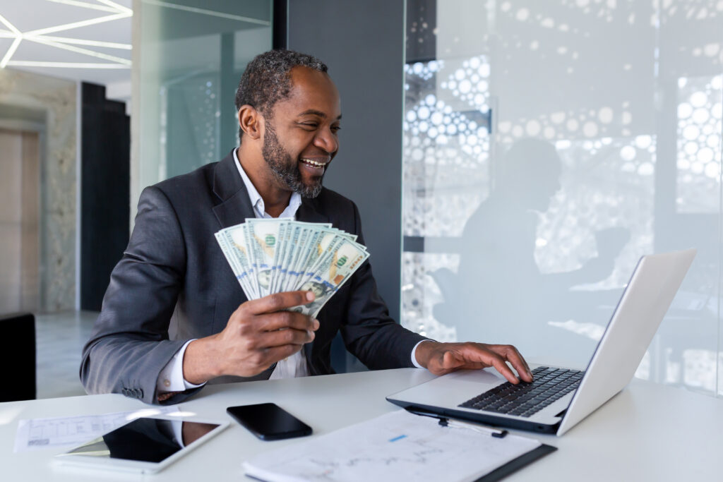 Businessman joyful got win profit income