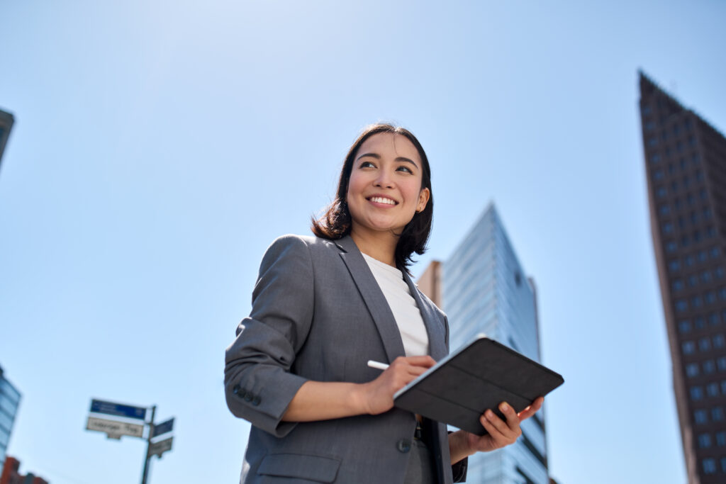 Smiling young Asian business woman