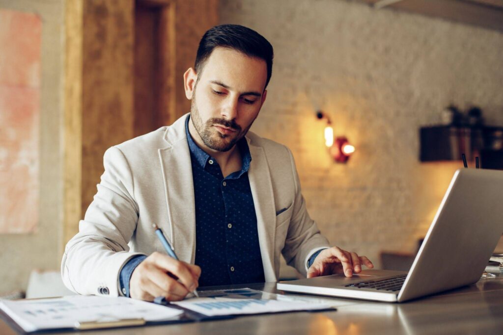 Entrepreneur applying online for business funding