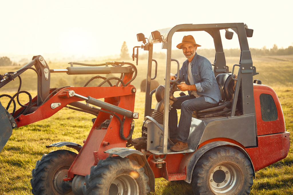 Mature couple working on the farm