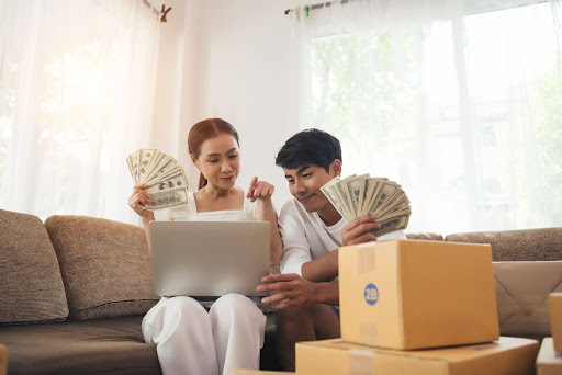 Couple using digital tablet and mobile phone